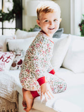 These Holly Jolly Reindeer unisex fitted pajamas are full of Christmas cheer! Featuring a playful all-over reindeer and holiday print, this festive pajama set blends comfort and whimsy for the whole family. Made from soft, stretchy fabric, these holiday fitted pajamas offer a snug, cozy fit that’s perfect for lounging, sleeping, or taking matching family Christmas photos. The cheerful design and comfortable feel make these unisex Christmas pajamas a must-have for the season.